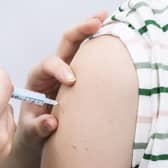 File image of a vaccine being administered