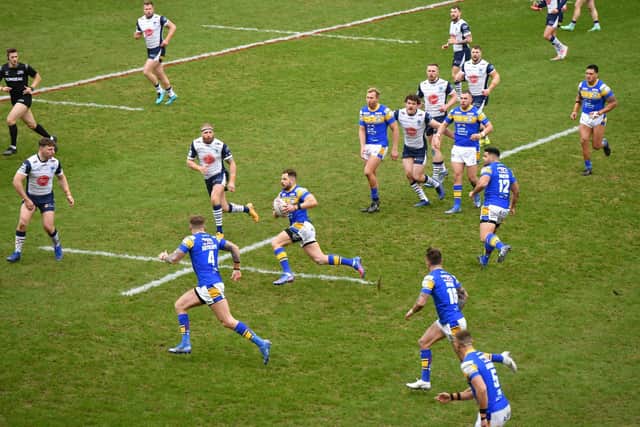 Aidan Sezer takes the ball to the line on his debut against Warrington Wolves. (Picture: SWPix.com)