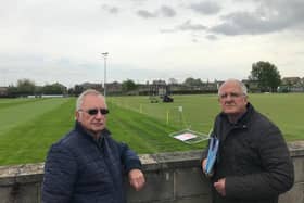 Frank Spivey (left) and Mike Wood at the Emley Moor Miners’ Recreation Ground, which needs a high safety net to protect houses earmarked for a neighbouring field. (Image: LDRS)