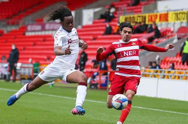 New Rotherham United signing Peter Kioso (left), pictured during an appearance on loan earlier in his career for Northampton Town at Doncaster Rovers. Picture: PA