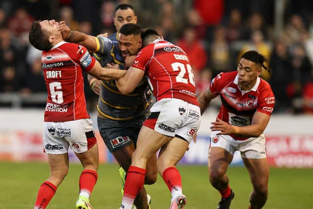 Kenny Edwards takes the ball in against Salford Red Devils. (Picture: SWPix.com)