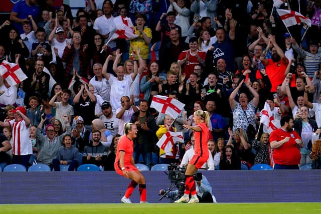 England's Beth Mead (right) celebrates scoring their side's second goal of the game at Elland Road. Picture: PA