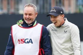 Matt Fitzpatrick of England celebrates with caddie Billy Foster after winning on the 18th green during the final round of the 122nd U.S. Open Championship at The Country Club on June 19, 2022 in Brookline (Picture: Rob Carr/Getty Images)