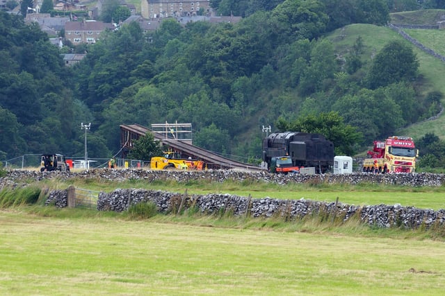 The action, which takes place on the back of a specially designed train carriage, is being filmed at the normally tranquil Levisham Station on the North Yorkshire Moors Railway.