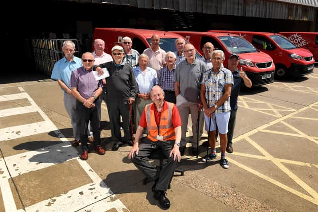 Jim with old work colleagues at Malmo Road Delivery Office in Hull Picture: Simon Hulme