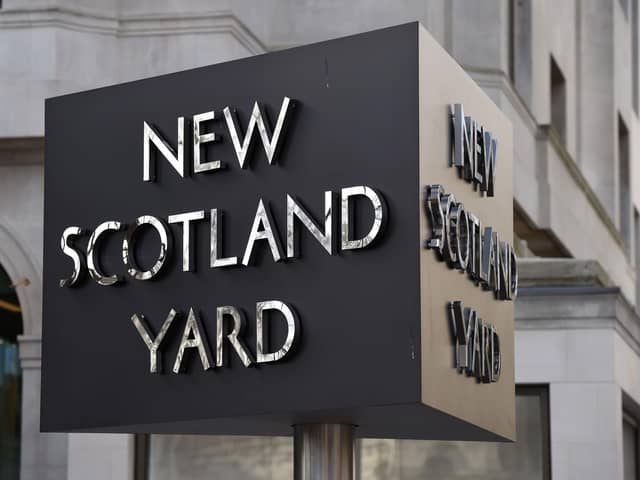 File photo dated 3/2/2017 of the New Scotland Yard sign outside the Metropolitan Police headquarters in London