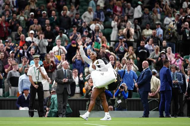 Serena Williams waves to the crowd after her defeat to Harmony Tan on day two of the 2022 Wimbledon Championships. Picture: PA