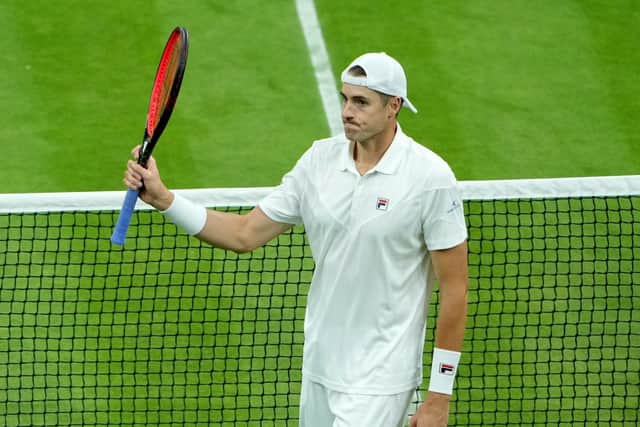 John Isner acknowledges the crowd after beating Andy Murray (Picture: PA)