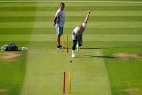 England captain Ben Stokes bowls under the watchful eye of bowling coach Jon Lewis during a nets session at Edgbaston. Picture: Martin Rickett/PA