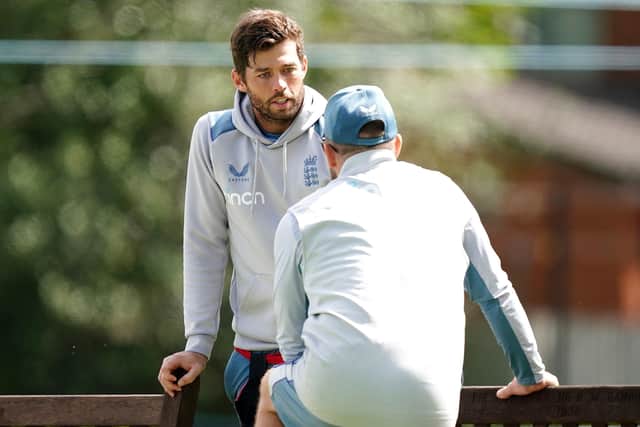 England's Ben Foakes (left) talks with head coach Brendon McCullum during a nets session at Edgbaston but is ruled out of facing India Picture: Martin Rickett/PA