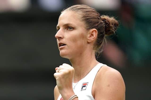 Karolina Pliskova celebrates winning the first set during her second round match against Great Britain's Katie Boulter at Wimbledon. Picture: Aaron Chown/PA