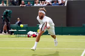 Liam Broady in action during his men's singles second round match against Diego Schwartzman at Wimbledon. Picture: Adam Davy/PA