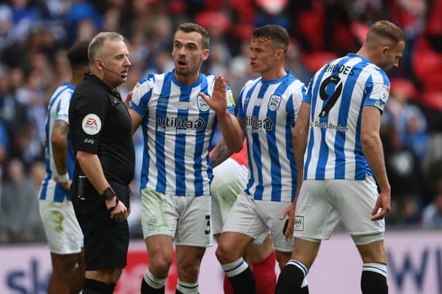 Linked: Harry Toffolo, second left, and Huddersfield Town missed out on the Premier League when they lost in the play-off final to Nottingham Forest - who could now bid for the left-back. (Photo by Mike Hewitt/Getty Images)