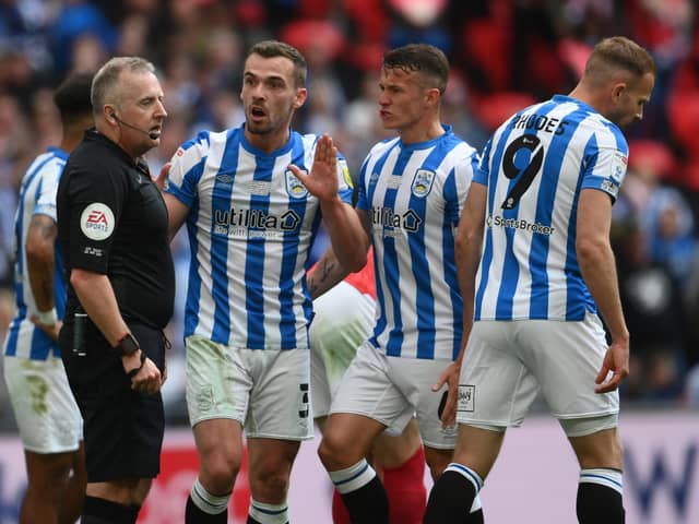 Linked: Harry Toffolo, second left, and Huddersfield Town missed out on the Premier League when they lost in the play-off final to Nottingham Forest - who could now bid for the left-back. (Photo by Mike Hewitt/Getty Images)