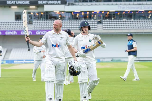 Yorkshire's Adam Lyth (l) with Harry Duke thanks the supporters after making a century against Warwickshire. Picture by Allan McKenzie/SWpix.com