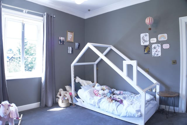 The cosy children's room with feature bed