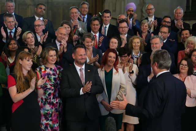 Labour Party MPs look on as party leader Keir Starmer greets newly-elected MP for Wakefield MP, Simon Lightwood, on June 27, 2022 in London, England. Photo by Carl Court/Getty Images.