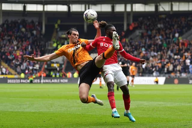 Hull City's Jacob Greaves and Nottingham Forest's Alex Mighten battle for the ball. Picture: PA