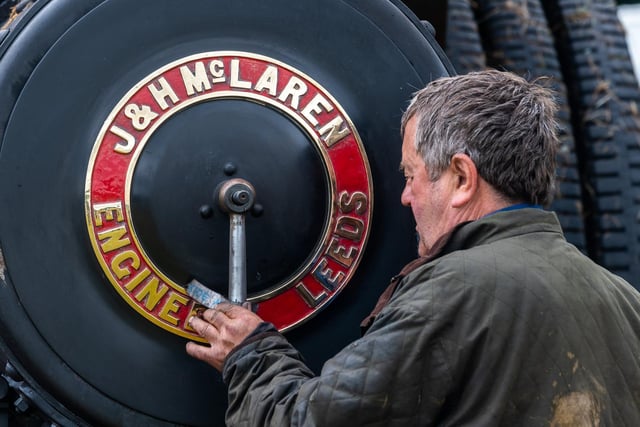 Mick Gaines-Burrill, of Swainby, cleaning the smoke box of his 1908 J&H McLaren Road Locomotive Traction Engine.