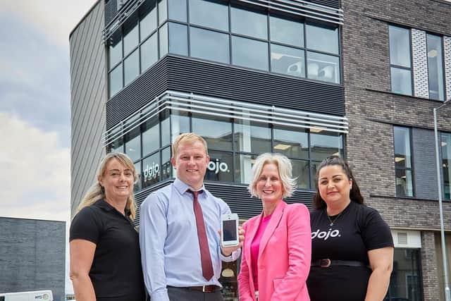 The Dojo team in Hull is now occupying a large part of the first floor and all of the second floor in the £3.75m fourth building within Wykeland Group’s @TheDock tech campus. Pictured with Wykeland’s Asset Manager John Gouldthorp are, from left, Dojo’s Workplace Experience Manager Liz Briggs, Head of Customer Service Meg Darling, and Commercial Support Manager Ashleigh Sainsbury.