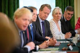 Culture Secretary Nadine Dorries listens to Boris Johnson speaking at Cabinet.