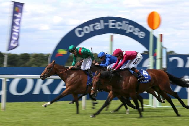 Rivals eclipsed: Vadeni (left) ridden by Christophe Soumillon wins The Coral-Eclipse at Sandown. Picture: Nigel French/PA Wire.