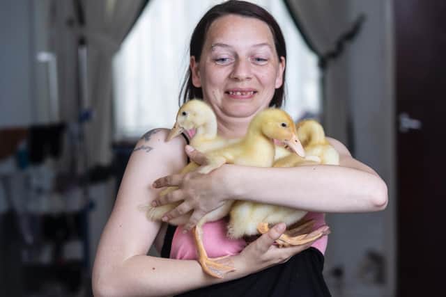 Deza Empson, 31, with her three surprise ducklings