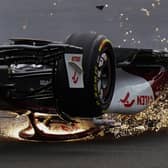 Lucky escape: Alfa Romeo’s Zhou Guanyu slides towards the barrier after a collision at the start of the British Grand Prix (Picture: Tim Goode/PA)
