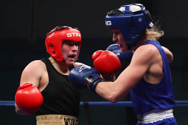 Jodie Wilkinson (red gloves) fights Lucy Kisielewska (blue gloves) in the Female NACs - under 69kg bout during the England Boxing National Amateur Championships 2021 at University of East London on December 11, 2021 in London, (Picture: Jacques Feeney/Getty Images)