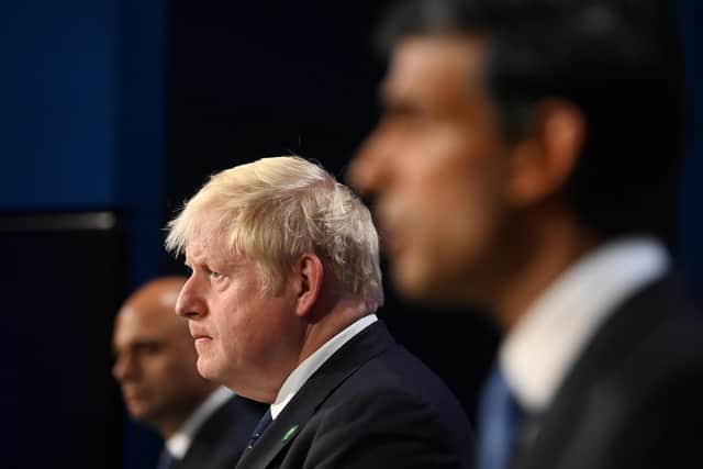 File photo dated 07/09/21 of (left to right) former Health Secretary Sajid Javid, Prime Minister Boris Johnson and former Chancellor of the Exchequer Rishi Sunak,
