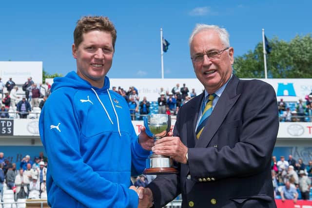Former Yorkshire CCC chairman Robin Smith presents Gary Ballance with the Duke of Leeds Trophy after the team's victory over Lancashire back in 2017. Picture by Allan McKenzie/SWpix.com