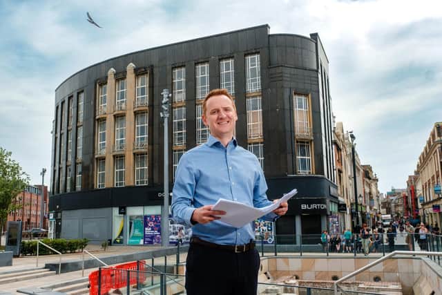 Wykeland Group Development Surveyor Tom Watson outside Hull’s landmark former Burton building. Wykeland has submitted plans to bring the building back to life.