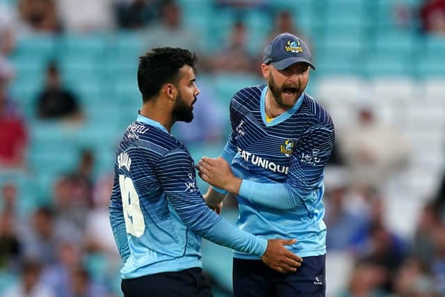 Yorkshire's Shadab Khan (left) and Adam Lyth celebrate the wicket of Surrey's Ollie Pope during the Vitality Blast T20 quarter-final match at The Oval, London. (Picture: Mike Egerton/PA)