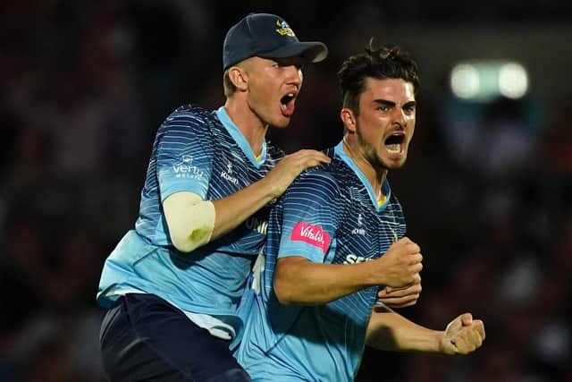 Yorkshire's Jordan Thompson (right) celebrates taking the wicket of Sunil Narine in the final over of the T20 quarter-final with Surrey (Picture: PA)