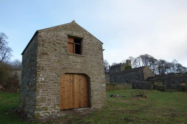 The restored Butching Garth is now a sheep shelter