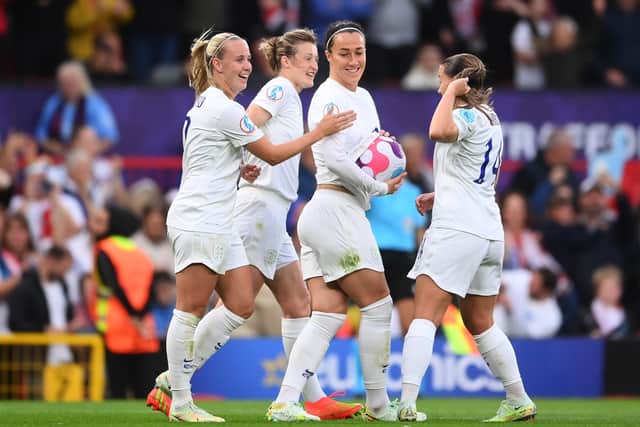 Beth Mead celebrates with Lucy Bronze, Fran Kirby and Ellen White of England after scoring their team's first goal during the UEFA Women's EURO 2022 group A match between England and Austria at Old Trafford on July 06, 2022 in Manchester. (Picture: Laurence Griffiths/Getty Images)