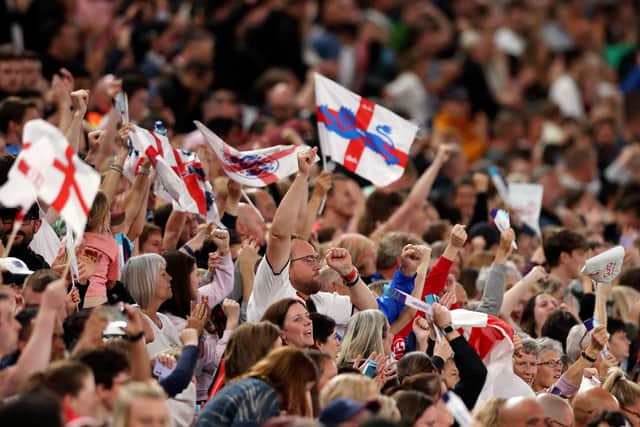 Fans enjoy the match atmosphere during the UEFA Women's Euro England 2022 group A match between England and Austria at Old Trafford. (Picture: Naomi Baker/Getty Images)