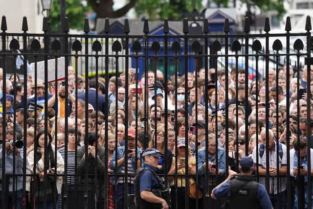 Crowds gathered outside Downing Street to cheer the Prime Minister's departure.