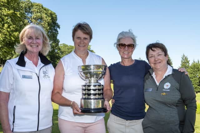 Bingley triumph: From left: YLCGA vice-captain Carolyn Ackroyd, Tracey Cooper, her caddie Andrea Johnson and YLCGA captain Alison Tracey. Picture: Chris Stratford