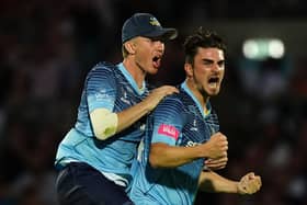 Yorkshire's Jordan Thompson (right) celebrates taking the wicket of Surrey's Sunil Narine during the Vitality Blast T20 quarter-final at The Oval. Picture: Mike Egerton/PA