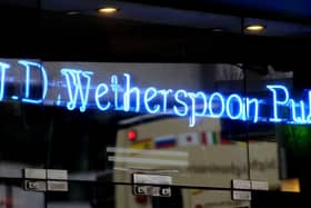 Prices at JD Wetherspoon could climb this year to battle soaring labour, food and energy costs, but they will still remain lower than competitors, analysts say.