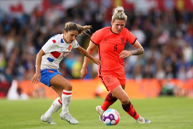 Danielle Van de Donk of Netherlands challenges England's Millie Bright. (Photo by Lewis Storey/Getty Images)