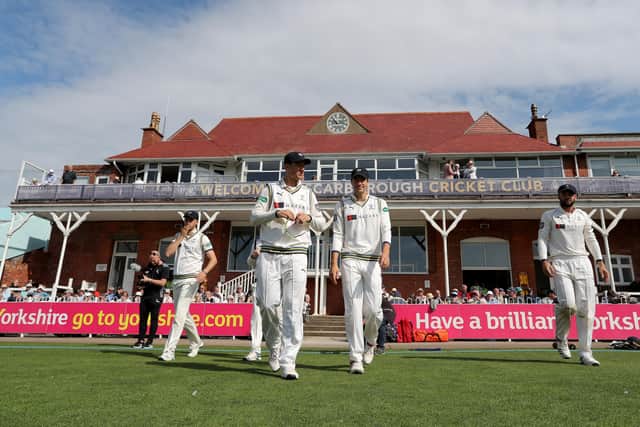 Yorkshire players take to the fioeld at Scarborough's North Marine Road cricket ground which will host two County Championship games this month (Picture: Richard Sellers/SWPix.com)