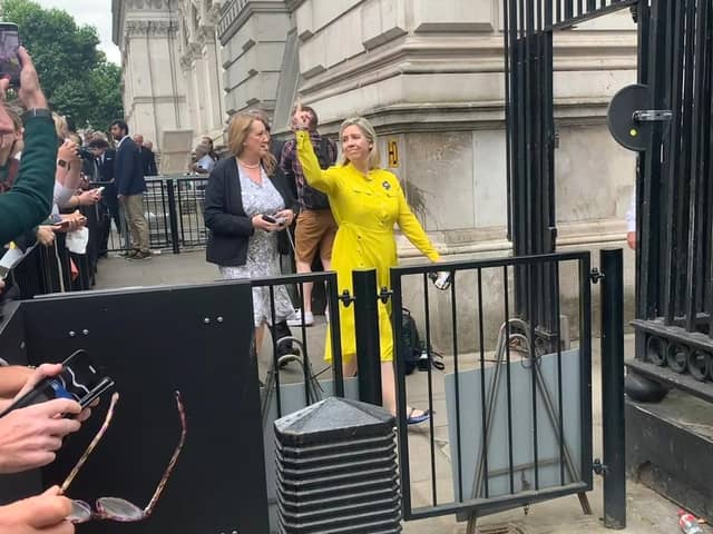Andrea Jenkyns, Conservative MP for Morley and Outwood, making an obscene gesture to crowds outside Downing Street
Photo: Alex Clewlow