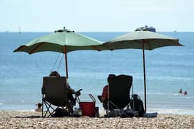 People enjoying the warm weather in Southsea, Hampshire
Photo: PA