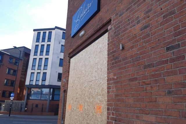 Bellairz nightclub on Shoreham Street, Sheffield, boarded up following a crash in which police believe a car was deliberately driven at a group of people before hitting the building.
