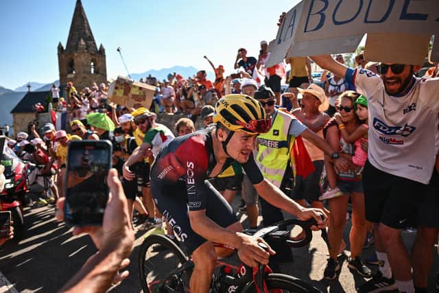 HISTORY MAKER: Leeds's Tom Pidcock cycles in a breakaway past "Dutch corner" in the ascent of Alpe d'Huez during the 12th stage of the Tour de France Picture: MARCO BERTORELLO/AFP via Getty Images