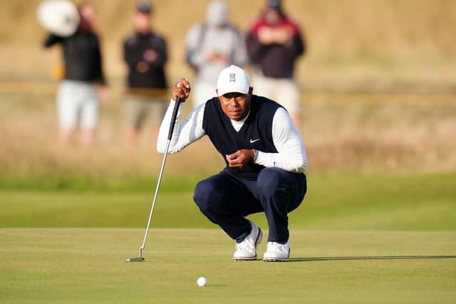 USA's Tiger Woods lines up a putt on the 16th green. Picture: Jane Barlow/PA Wire.