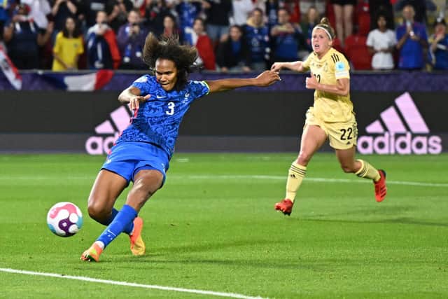 Wendie Renard pounces on the rebound after her penalty is saved by Nicky Evrard. Pic: Oli Scarff.