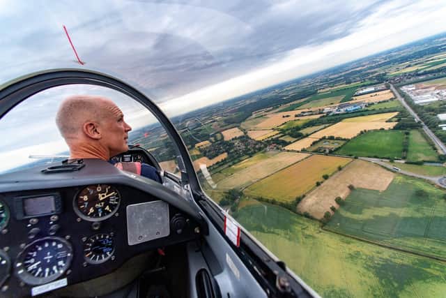 Craig Scott, Wolds Gliding Club Chairman, flying over the countryside near Pocklington  Picture: Bruce Rollinson